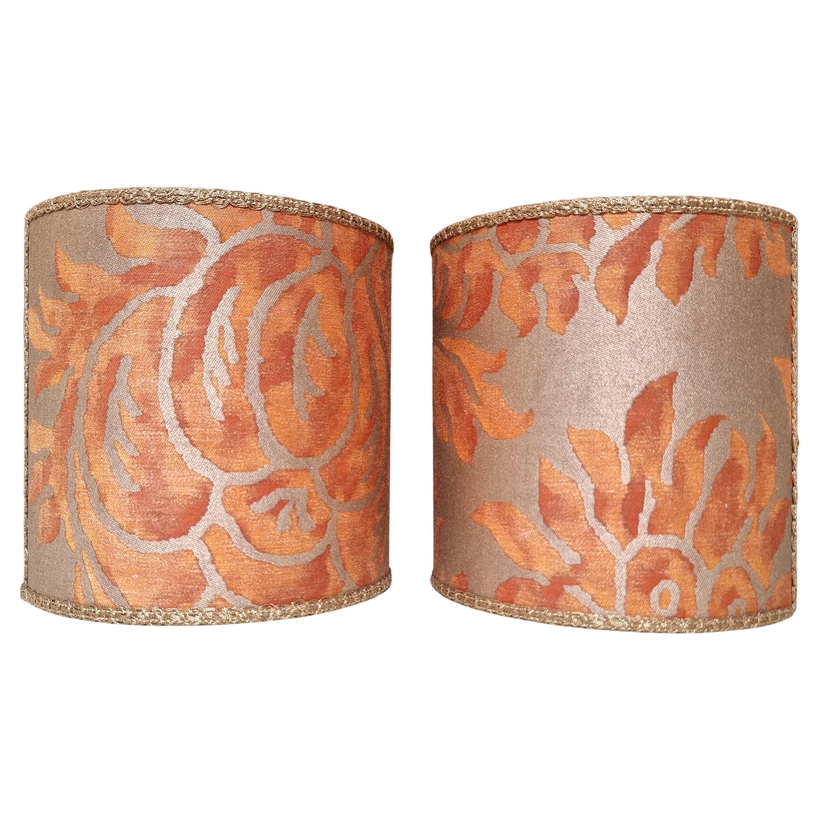 This pretty set of 2 clip on wall sconce half drum lampshades with a fitting that clips over the light bulb is handmade using Fortuny fabric - Barberini pattern - in burnt apricot & silvery gold color, finished with gold trim. Suitable for