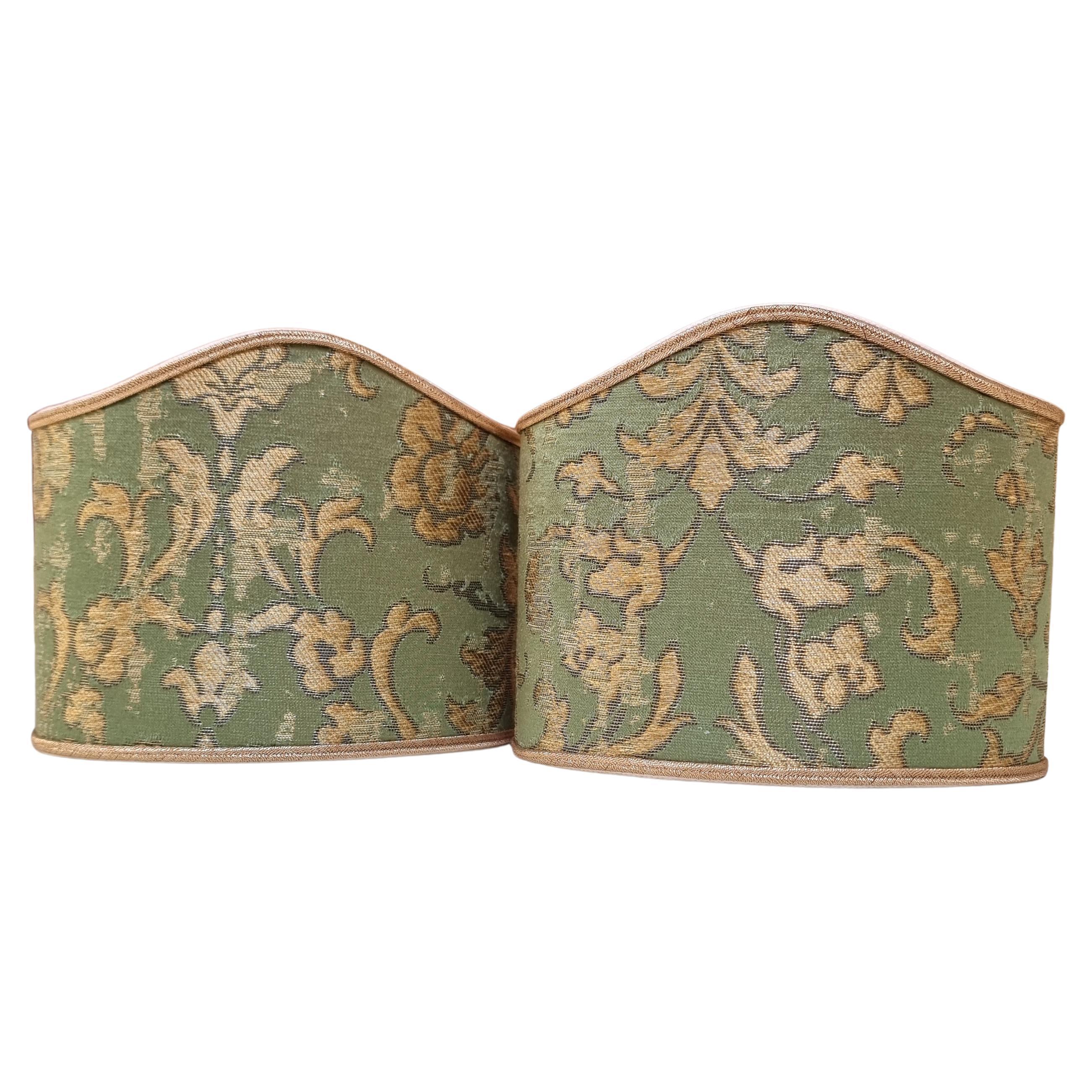 This pretty set of 2 clip on wall sconce lampshades with a fitting that clips over the light bulb is handmade using Rubelli silk jacquard fabric - Les Indes Galantes pattern - in jade green and gold color, finished with gold trim. Suitable for
