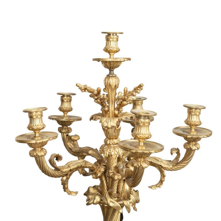 European Pair of Clodion Figural Patinated Candelabra For Sale