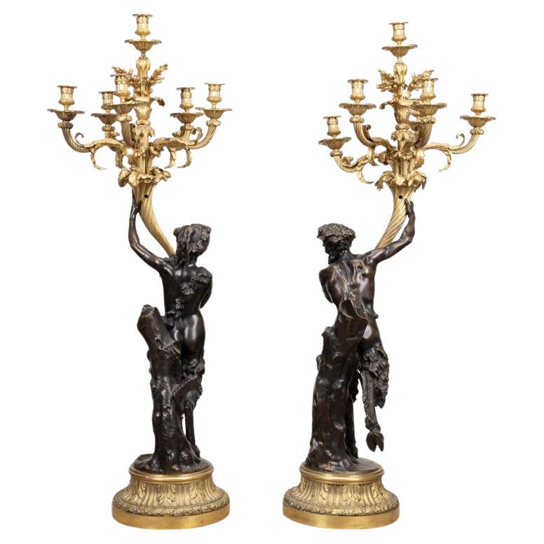 Pair of Clodion Figural Patinated Candelabra For Sale