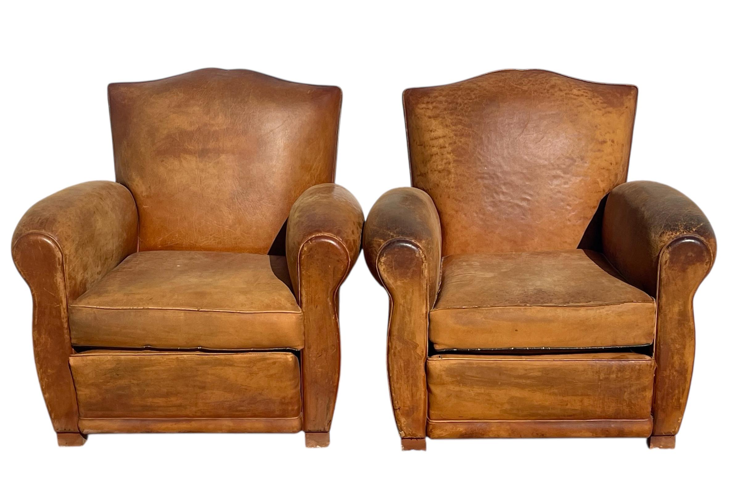 Pair of club armchairs dating from the 1930s. They are in good condition.

Dimensions
Height 80cm
Width 75cm
Depth 85cm
Seat height 37cm