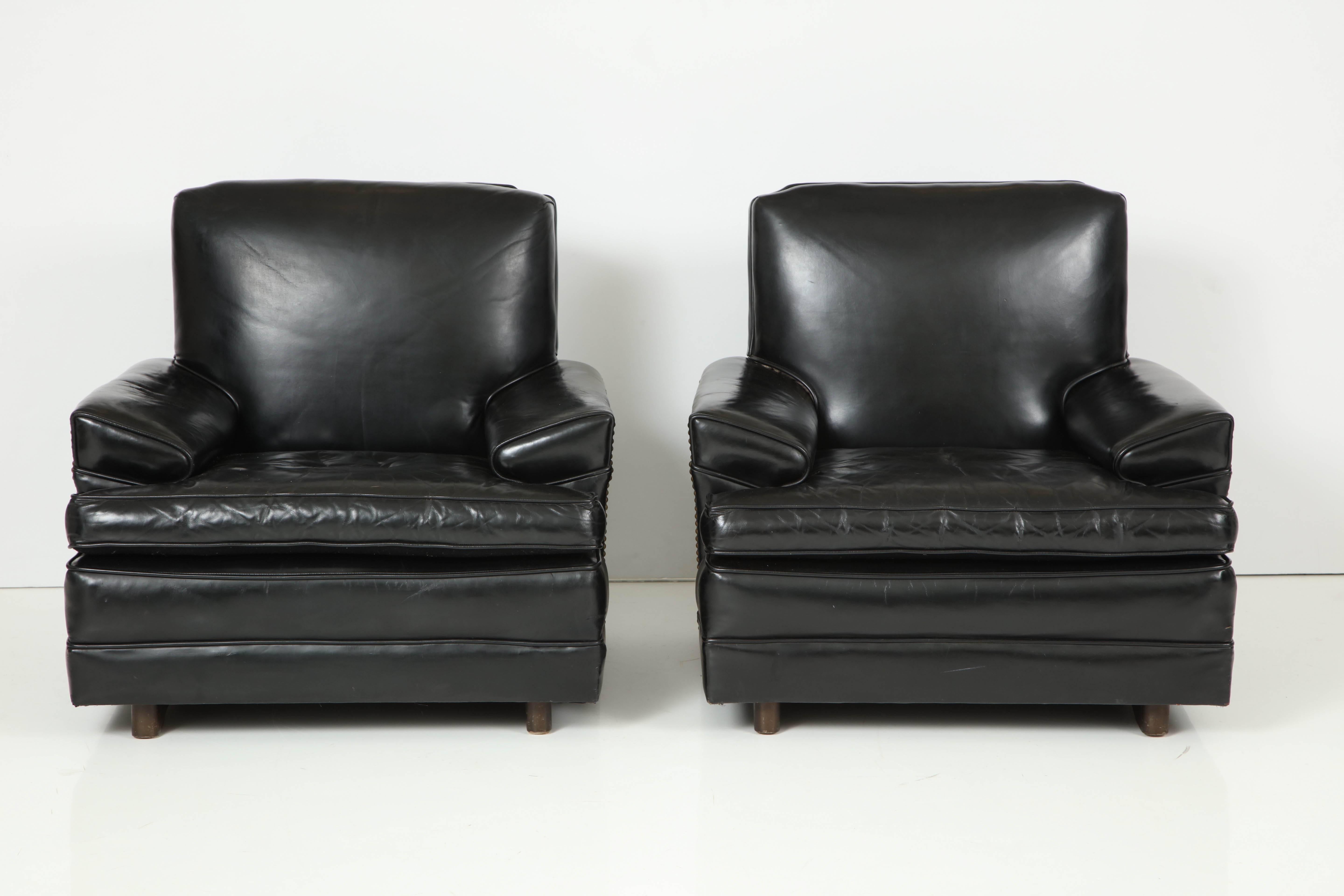 Large pair of patent leather chairs attributed to Sam Marx, original patent leather and nailheads.
 