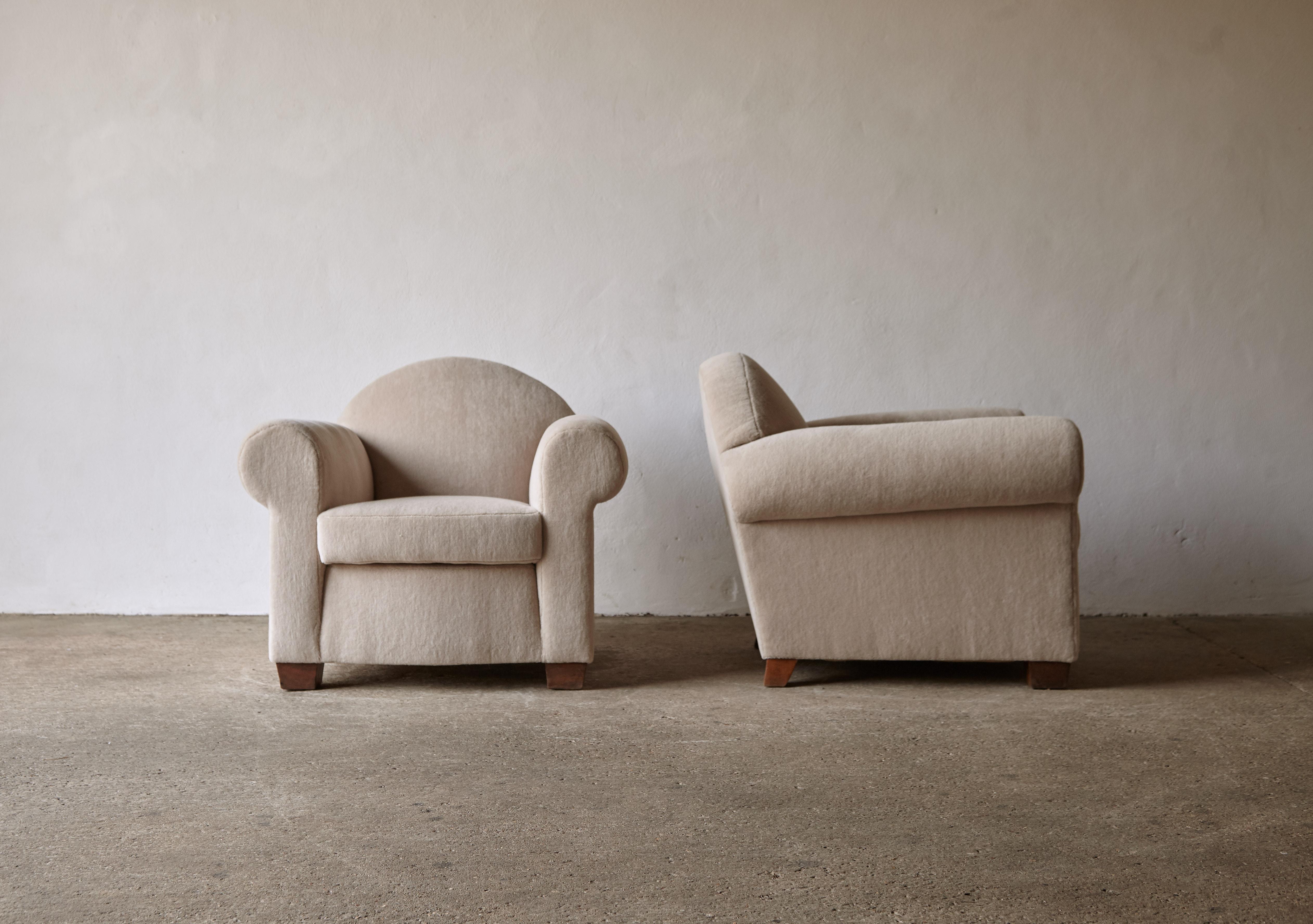 A superb pair of 1930s French club chairs. Newly upholstered in a premium 100% alpaca fabric. Fast shipping worldwide.
  

