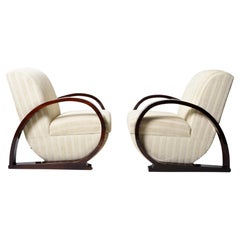 Pair of Club Chairs with Curved Arms