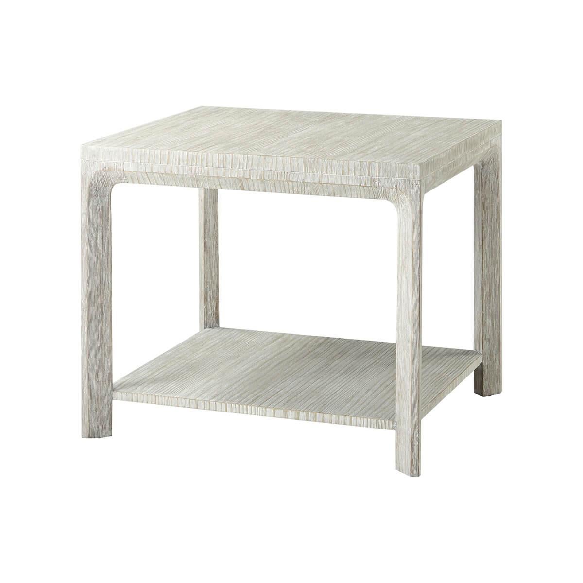 A four-legged wire-brushed cerused pine side table is supported by a bevel-shaped cross section and seen here in our Sea Salt finish.

Dimensions: 24