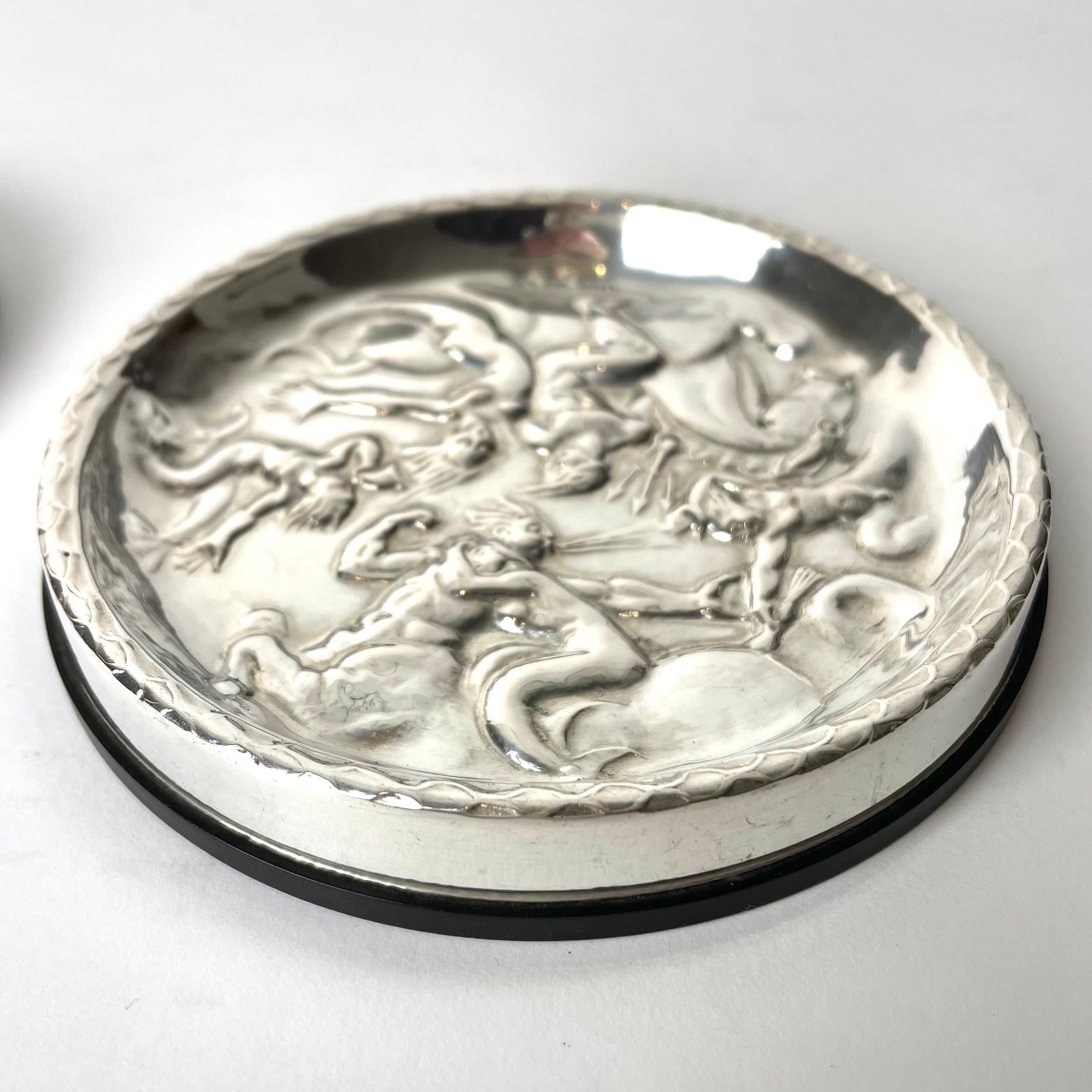 Pair of Coasters in Silver and Bakelite. After Carl Milles ”The wind game” 1937 For Sale 2