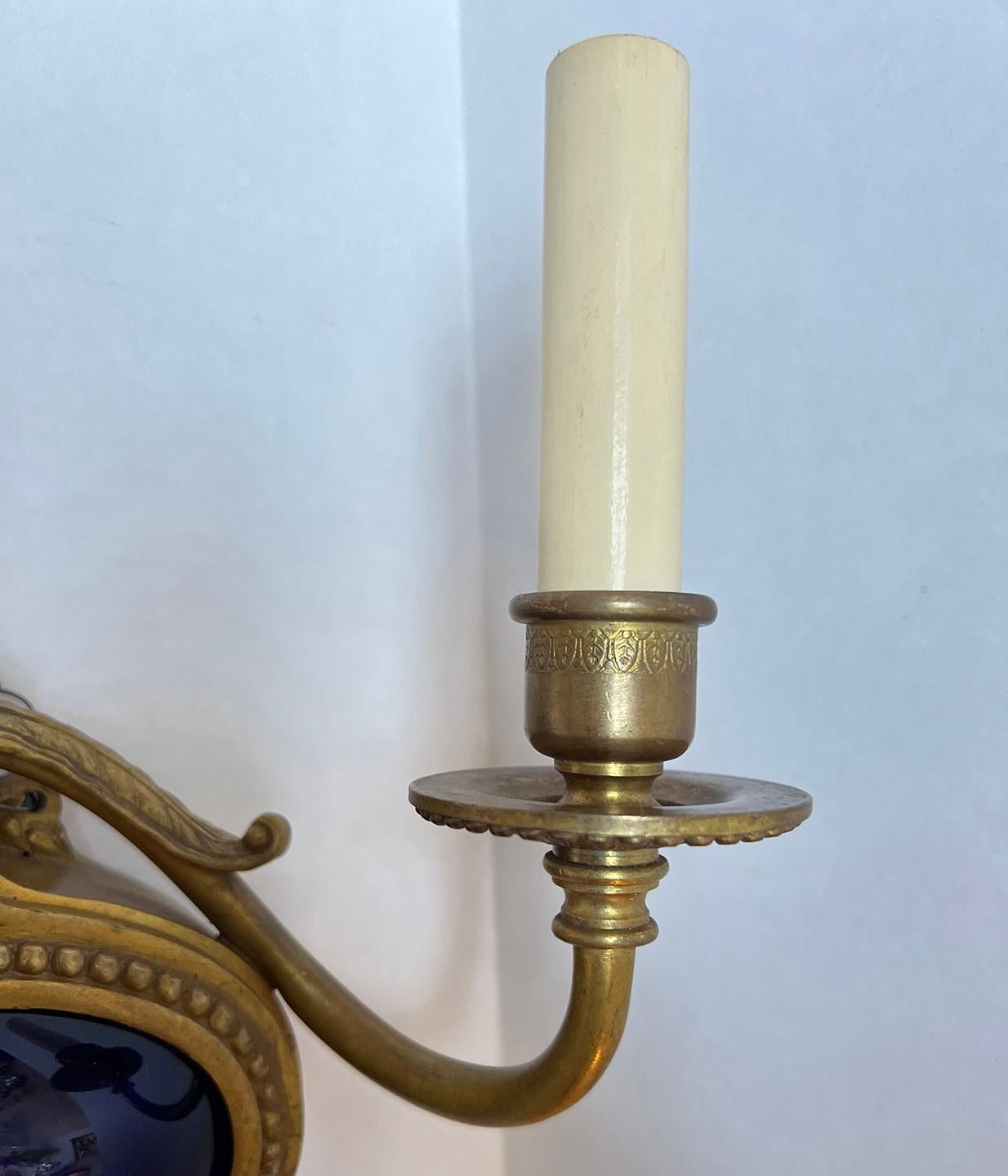Pair of circa 1920's French neoclassic style sconces.

Measurements:
Height: 11