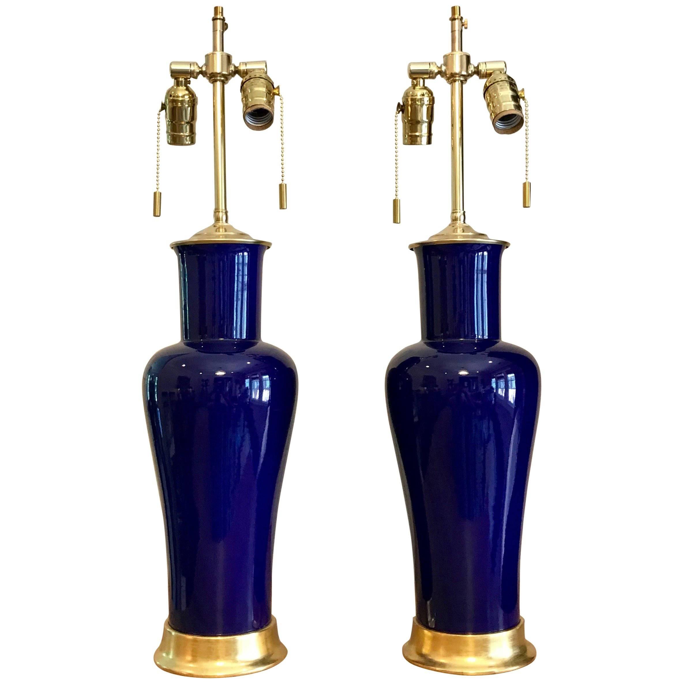 Pair of Cobalt Blue Porcelain Lamps on 23-Karat Water Giltwood Bases