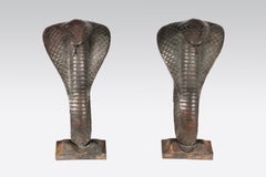 Pair of Cobra Andirons by Edgar Brandt