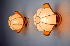 Pair of "cocoon" wall lights, Italy, 1960