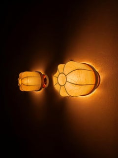 Pair of "cocoon" wall lights, resin and pine, Italy, 1970