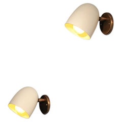 pair of Danke Studio sconces brass and lacquered metal 