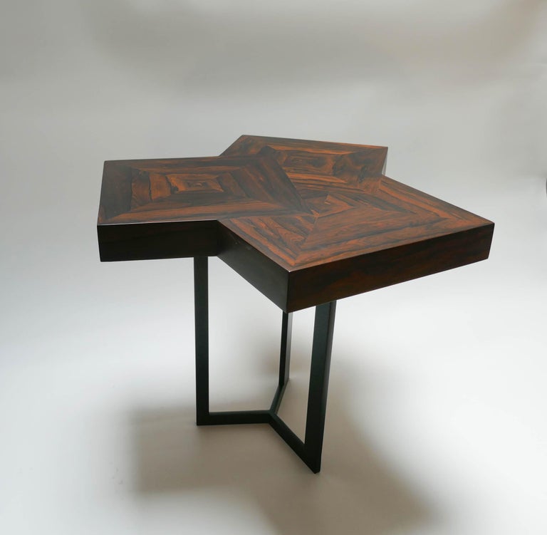 Pair of coffee table in Ziricotte wood and metal black laqued.