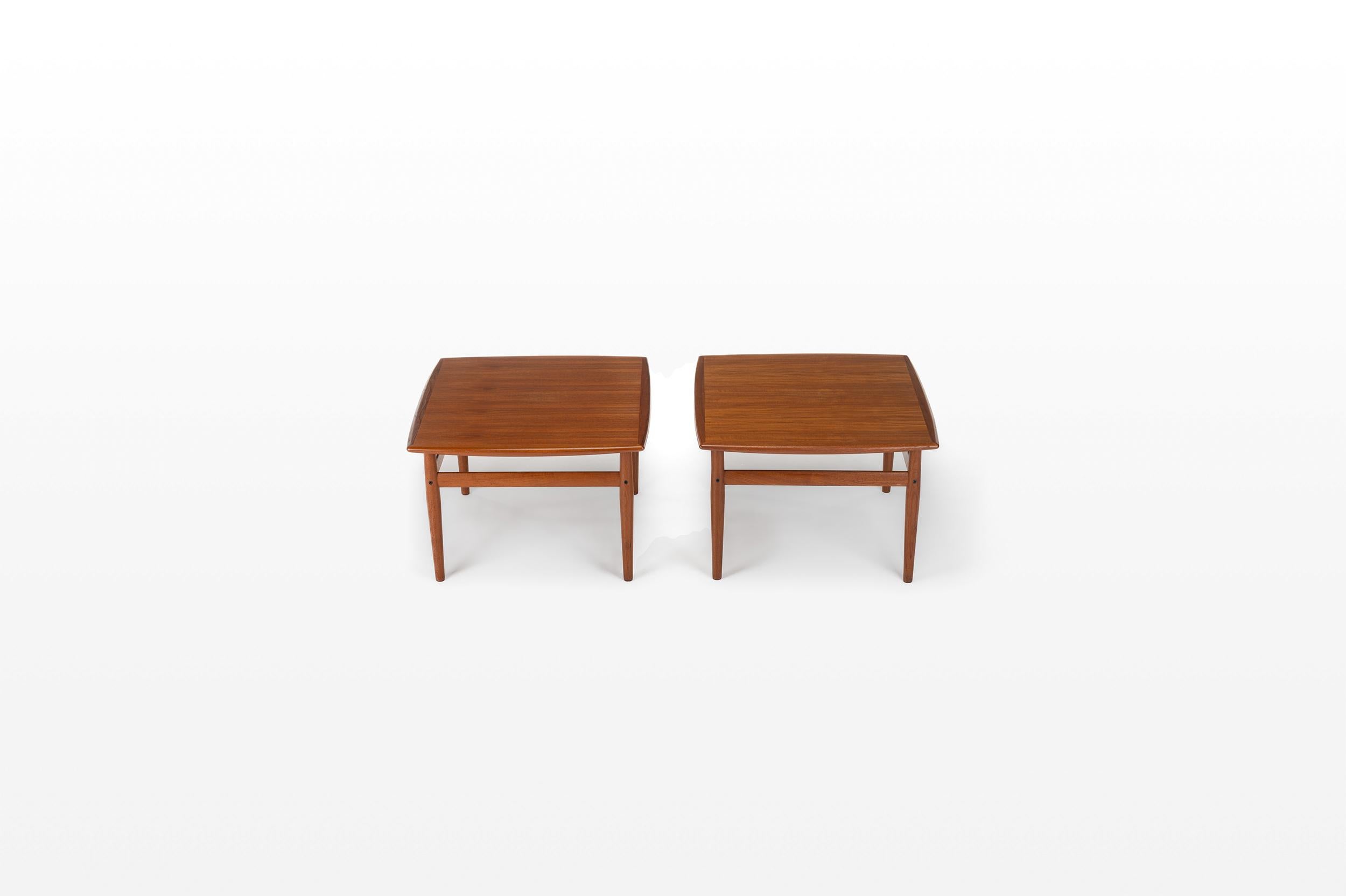 Set of two coffee tables in teak by Grete Jalk for Glostrup, Denmark 1960s. These two coffee tables have been restored by our own studio.