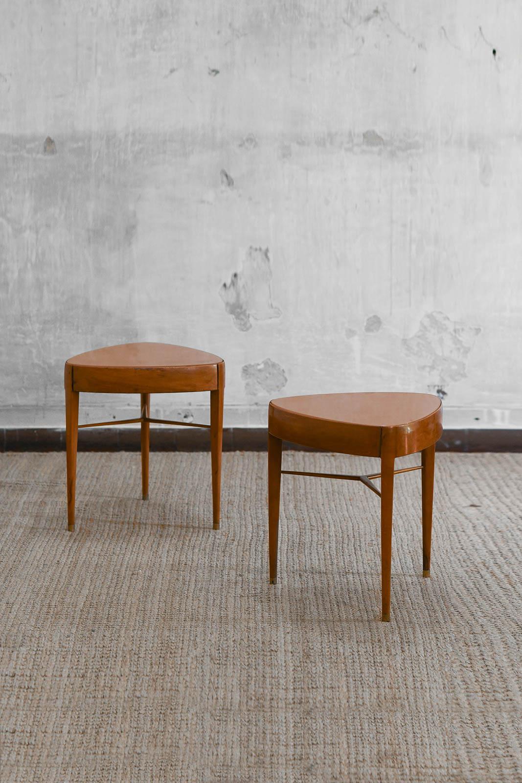 Pair of tables with retractable drawers, 1960s
Materials: Wooden structure with glass shelf and brass feet.