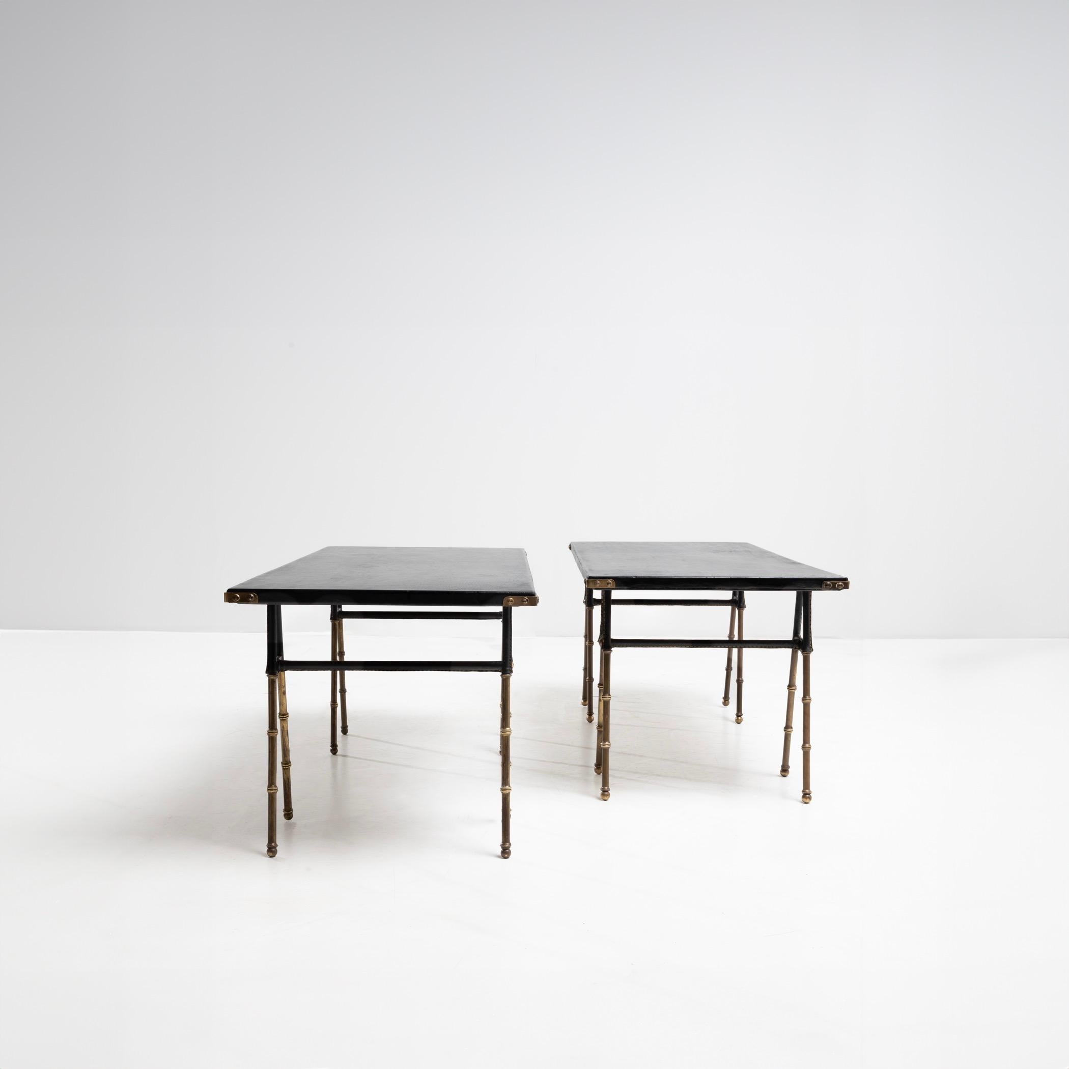French Pair of coffee tables with trestle legs by Jacques Adnet For Sale