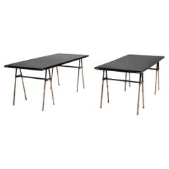 Pair of coffee tables with trestle legs by Jacques Adnet