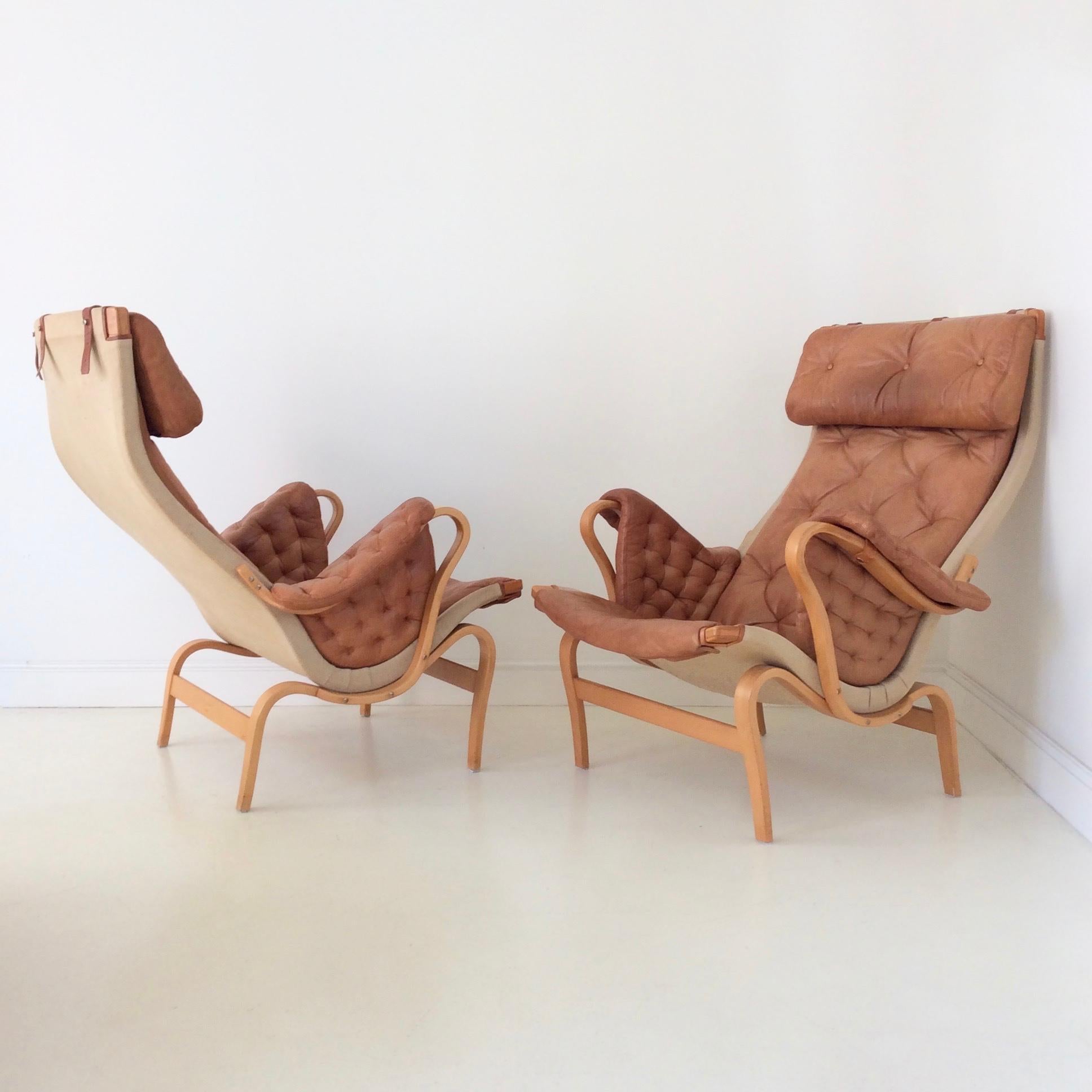 Swedish Pair of Cognac Leather Pernilla Armchairs by Bruno Mathsson, Sweden, circa 1970