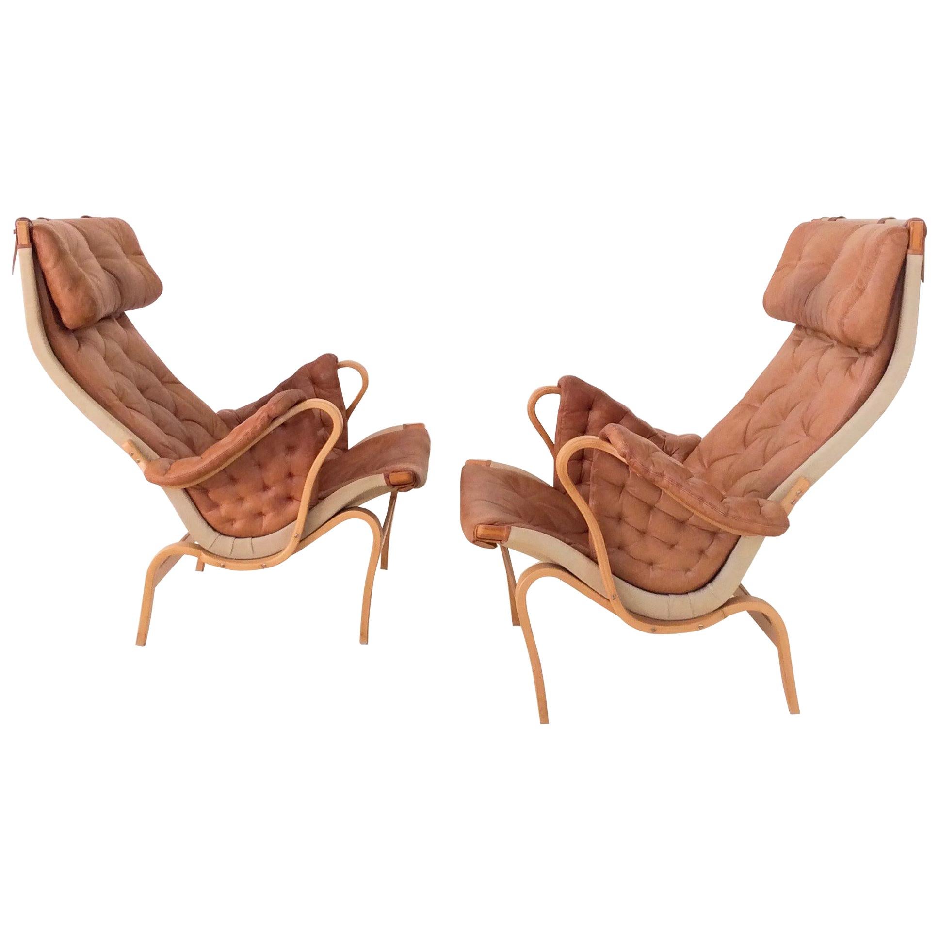 Pair of Cognac Leather Pernilla Armchairs by Bruno Mathsson, Sweden, circa 1970
