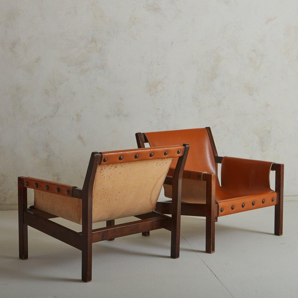 Pair of Cognac Leather Studded Slingback Lounge Chairs, France 1970s In Good Condition For Sale In Chicago, IL