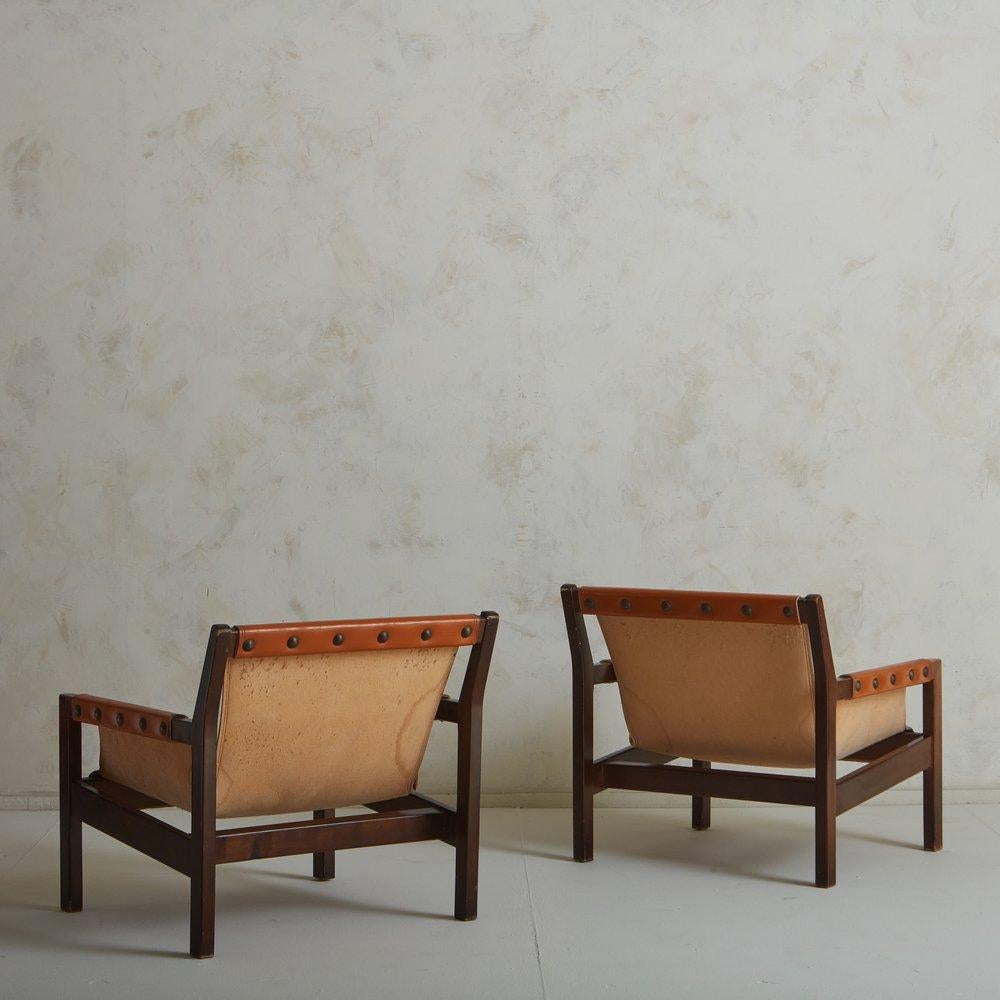 Late 20th Century Pair of Cognac Leather Studded Slingback Lounge Chairs, France 1970s For Sale