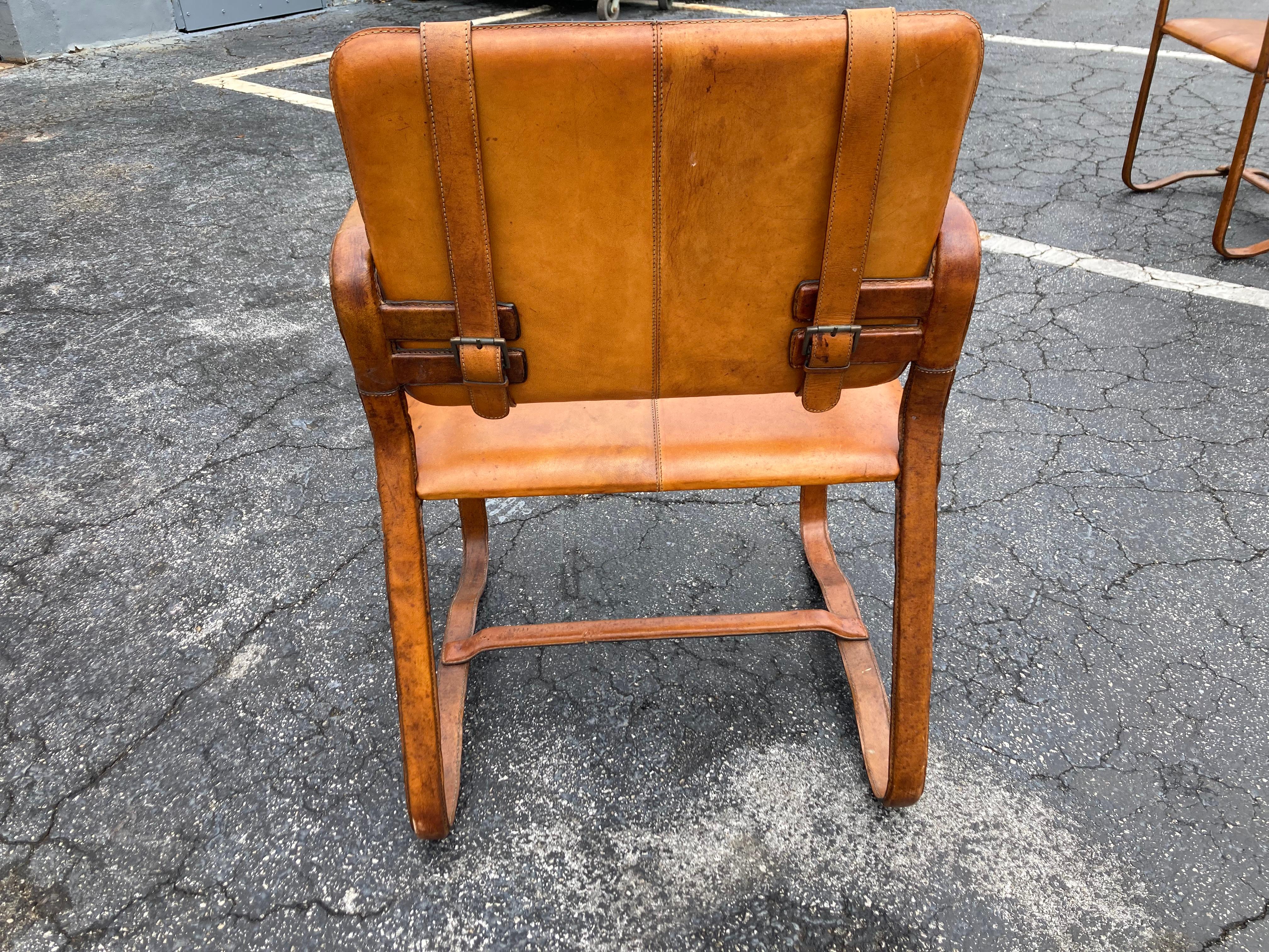 Pair of Cognac Leather Wrapped Arm Chairs in the style of Jacques Adnet 5