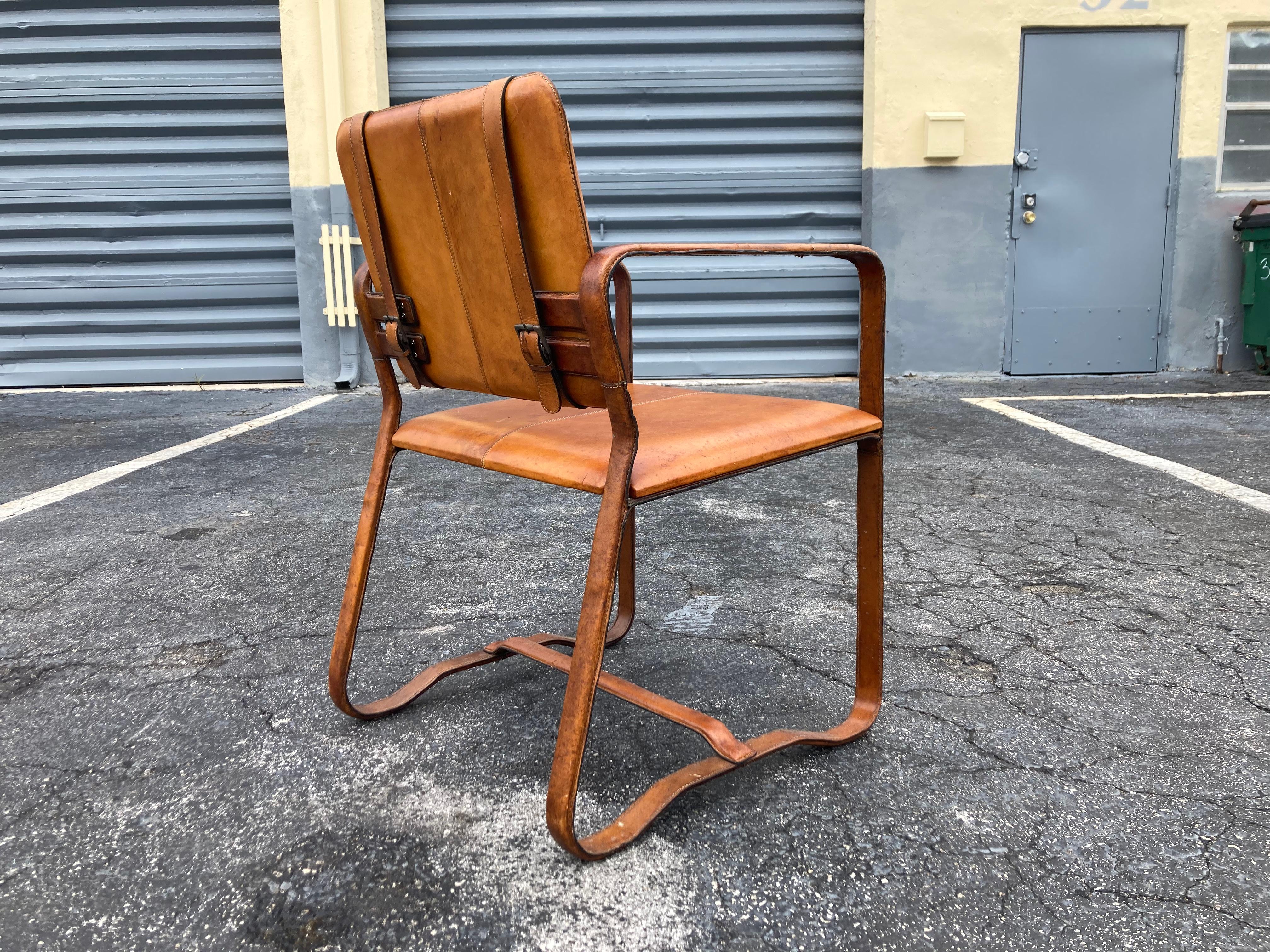 Pair of Cognac Leather Wrapped Arm Chairs in the style of Jacques Adnet 3