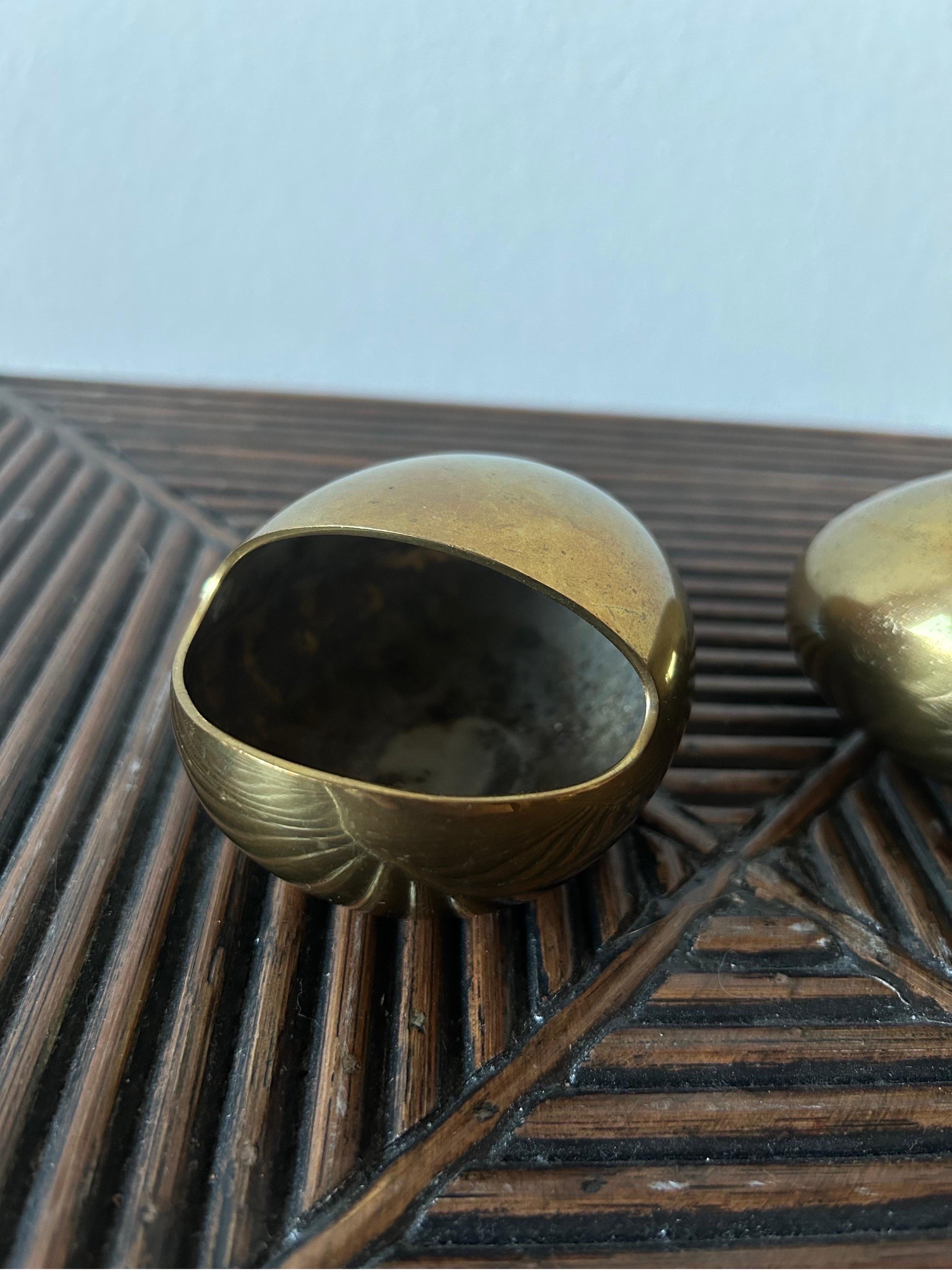 Pair of Cohr ashtrays made in patinaed brass in Denmark in the 1960’s.
This model is called the smile and can be used as a ashtray or as decorative object.
The ashtray is designed by danish silversmith Hans Bunde.

Carl Mads Cohr (11 August 1862