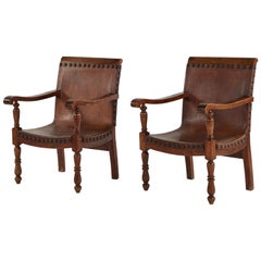 Pair of Colonial Armchairs in Leather