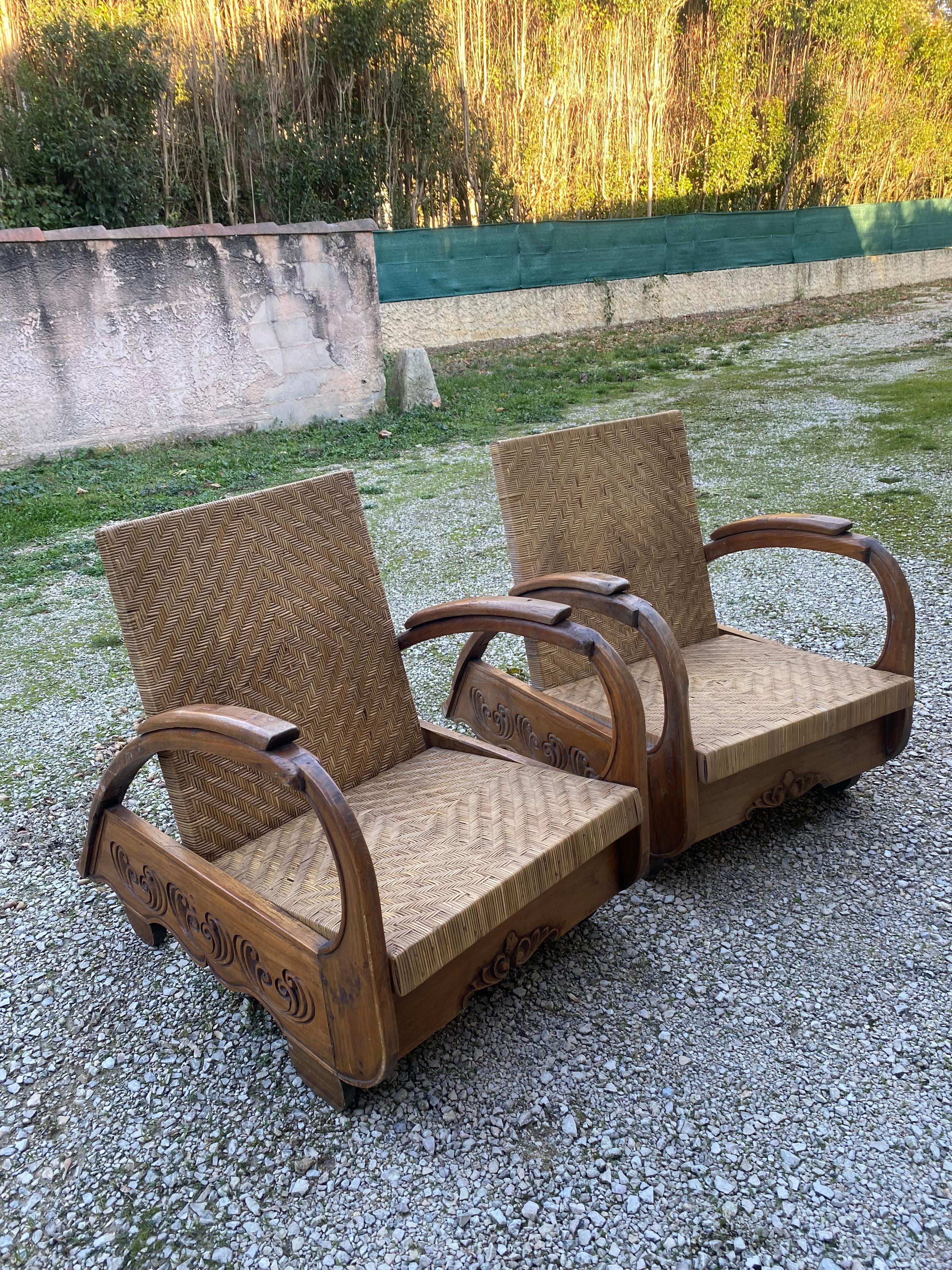 Pair of colonial art deco armchairs Rattan and teak core Bon état - En vente à Saint ouen, FR