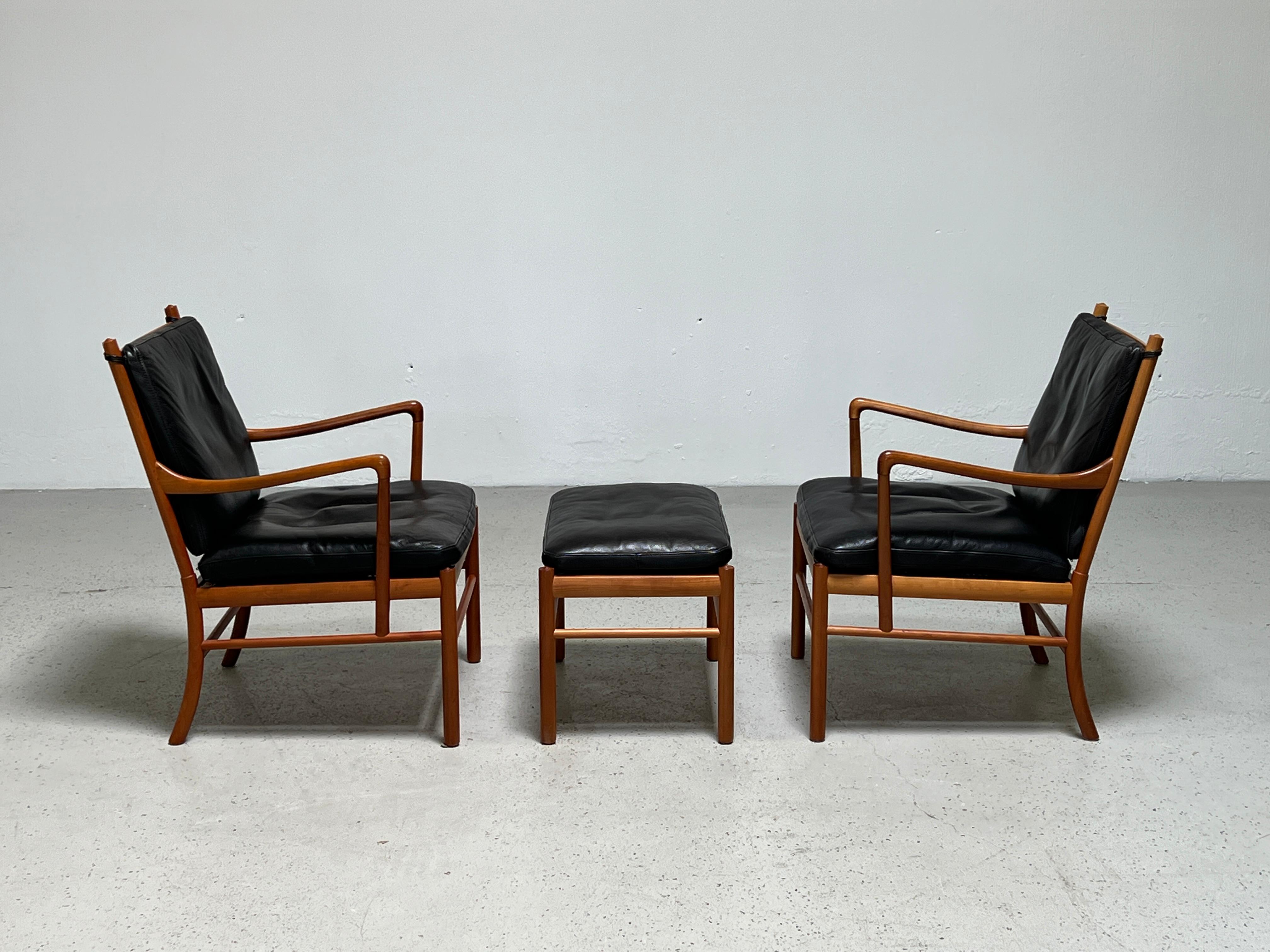 Mid-20th Century Pair of Colonial Chairs and Ottoman by Ole Wanscher