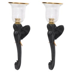 Pair of Colonial Style Elephant Carved and Ebonized Hurrycane Sconces by Chapman