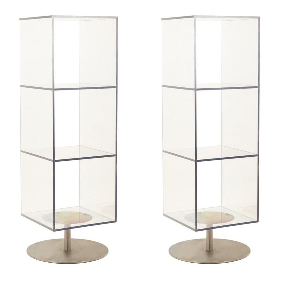 Pair of column shelving units made of Plexiglas and brushed metal. 1970s-80s. For Sale