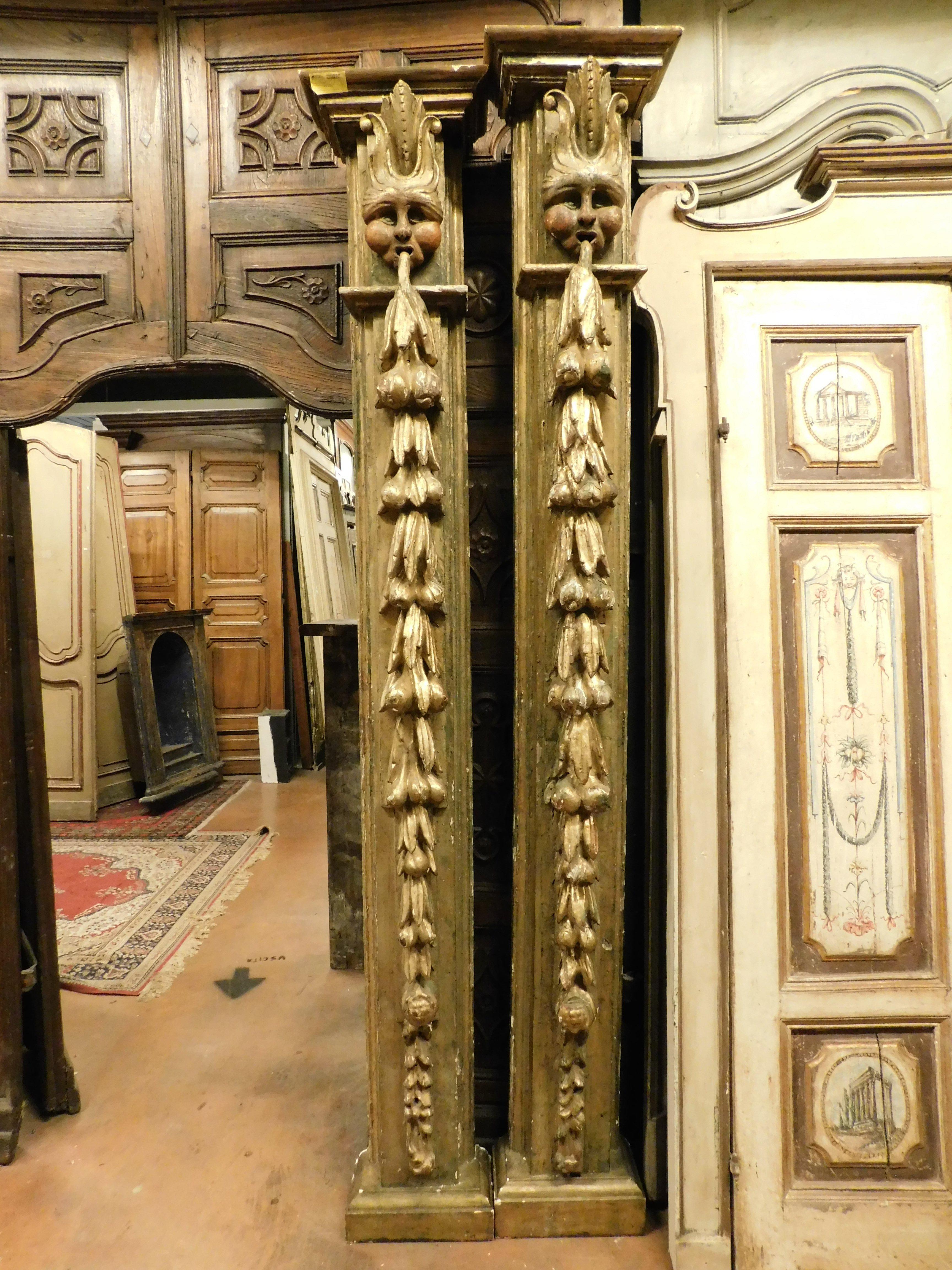Spanish Pair of columns in gilded, lacquered and carved wood with masks, Spain For Sale