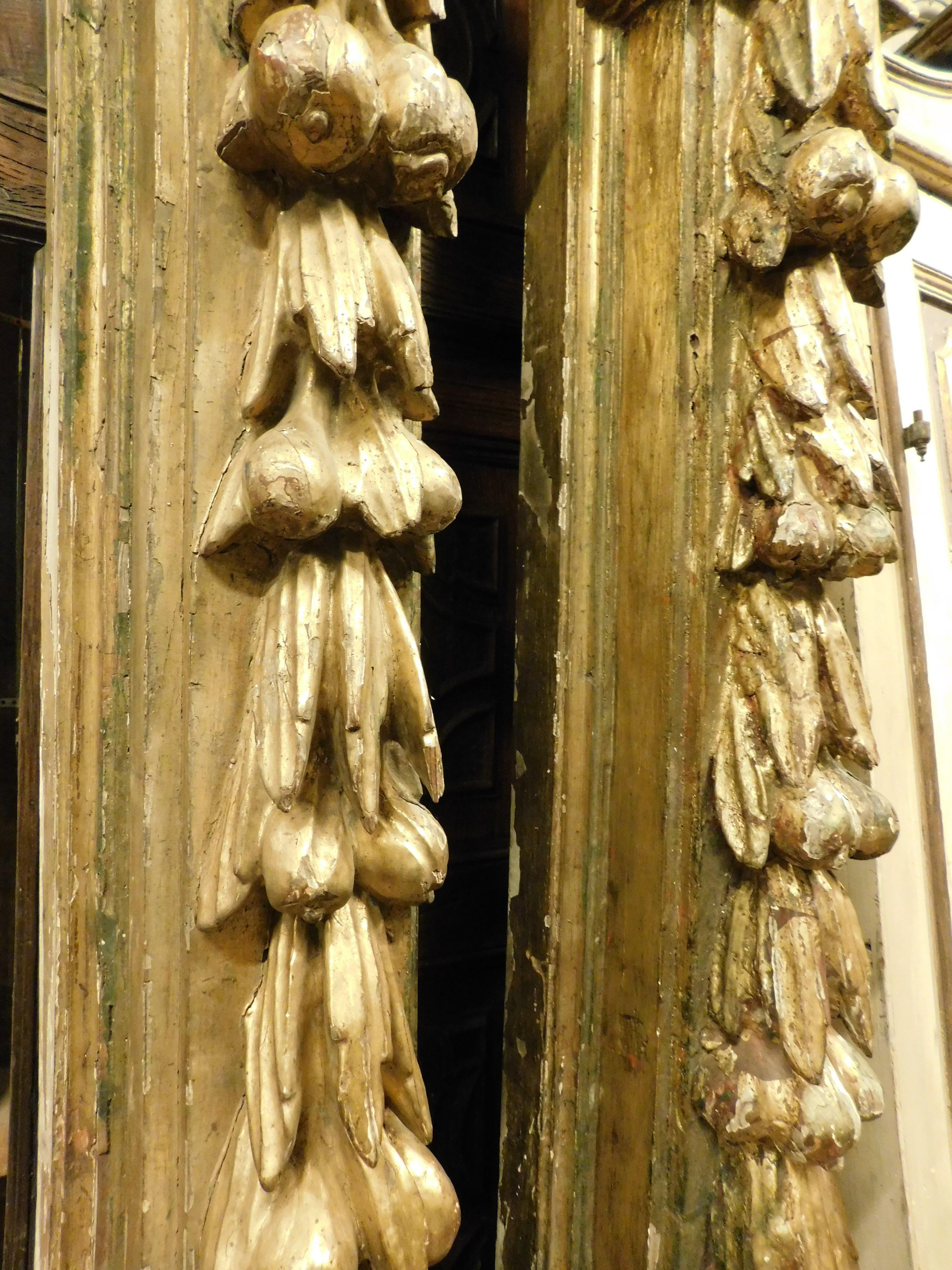 18th Century and Earlier Pair of columns in gilded, lacquered and carved wood with masks, Spain For Sale
