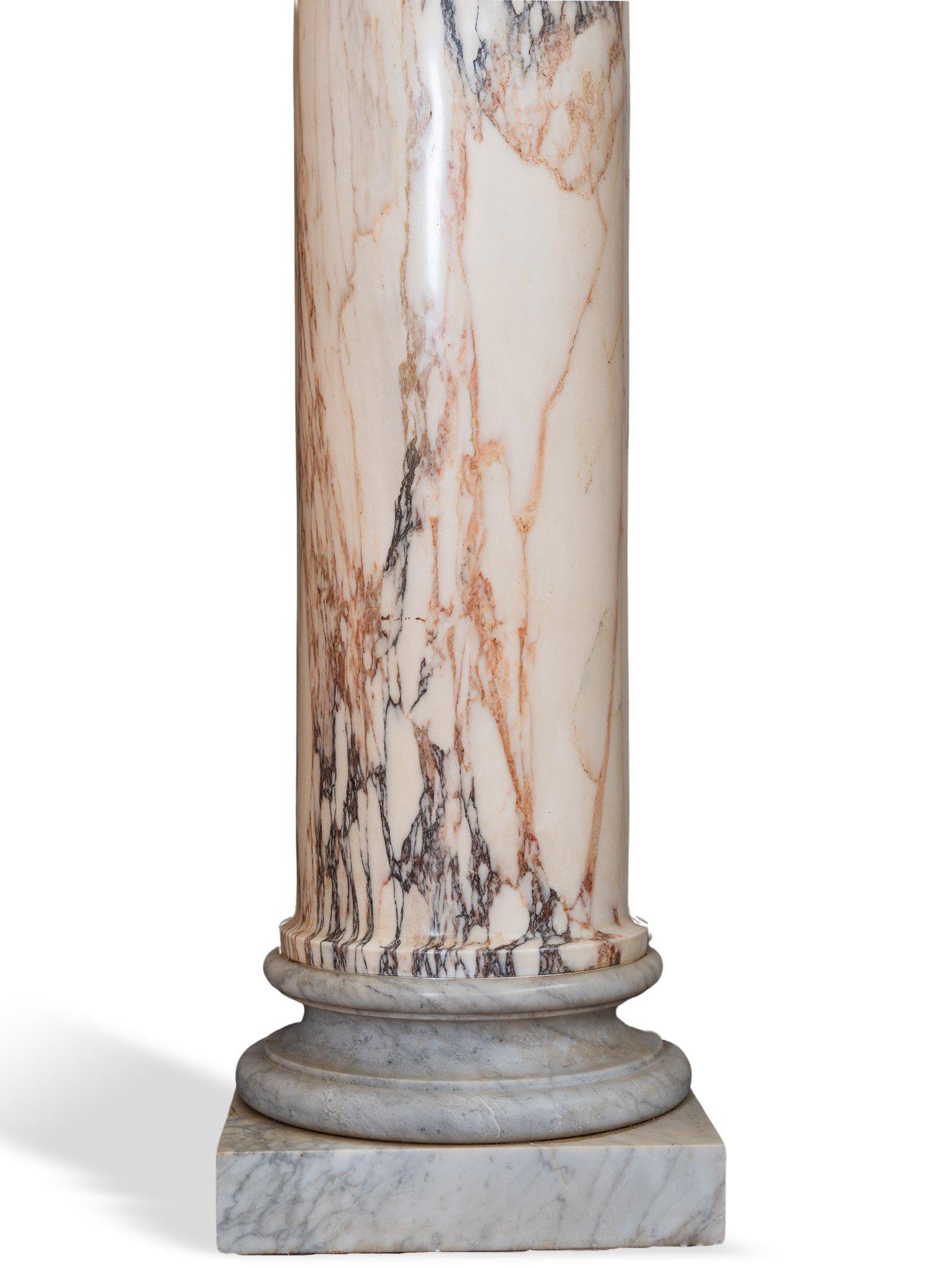 Pair of columns in Pavonazzetto marble. ADDITIONAL PHOTOS, INFORMATION OF THE LOT AND SHIPPING INFORMATION CAN BE REQUEST BY SENDING AN EMAIL. Tags: Coppia di colonne in marmo Pavonazzetto. Par de columnas en mármol Pavonazzetto. Paire de colonnes