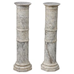 Pair of columns in veined alabaster