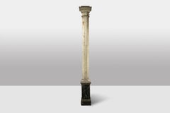 Pair of columns in wood painted to imitate marble. 1880s.
