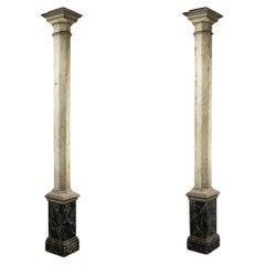 Pair of columns in wood painted to imitate marble. 1880s.