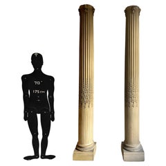 Pair of columns with oak leaves in carved wood and stucco, late 19th century