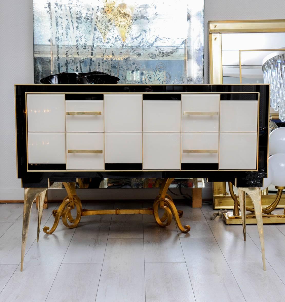 Pair of commodes with two drawers in tinted glass black and ivory with two drawers.