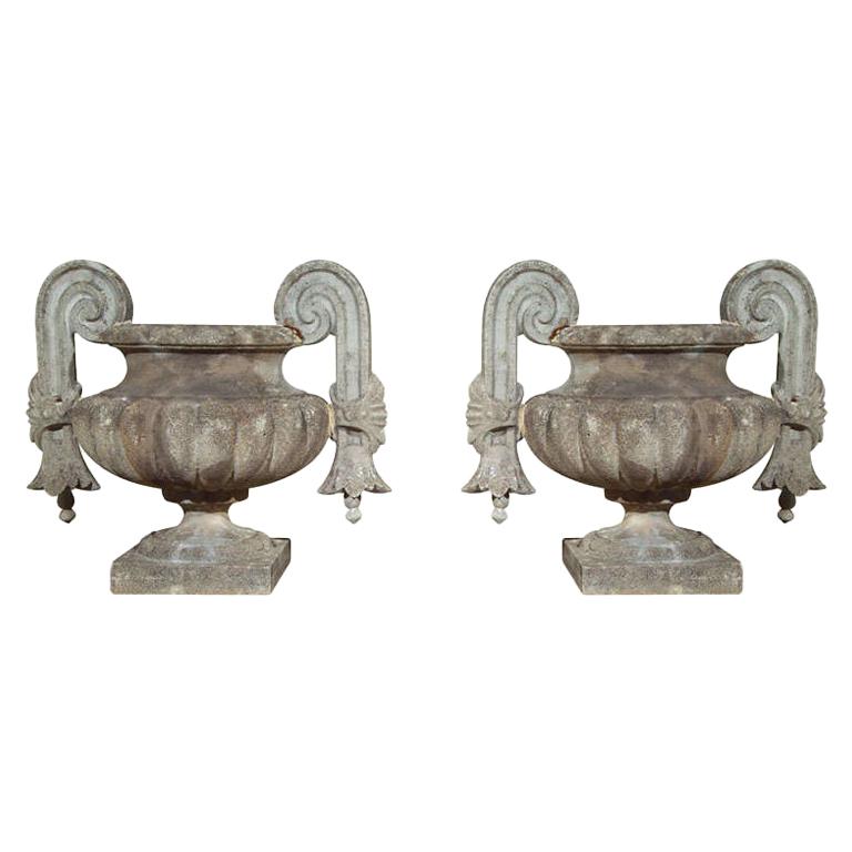 Pair of Composed Stone Urns For Sale