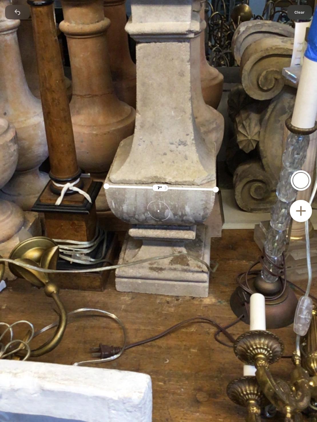 A pair of composite stone baluster lamps.