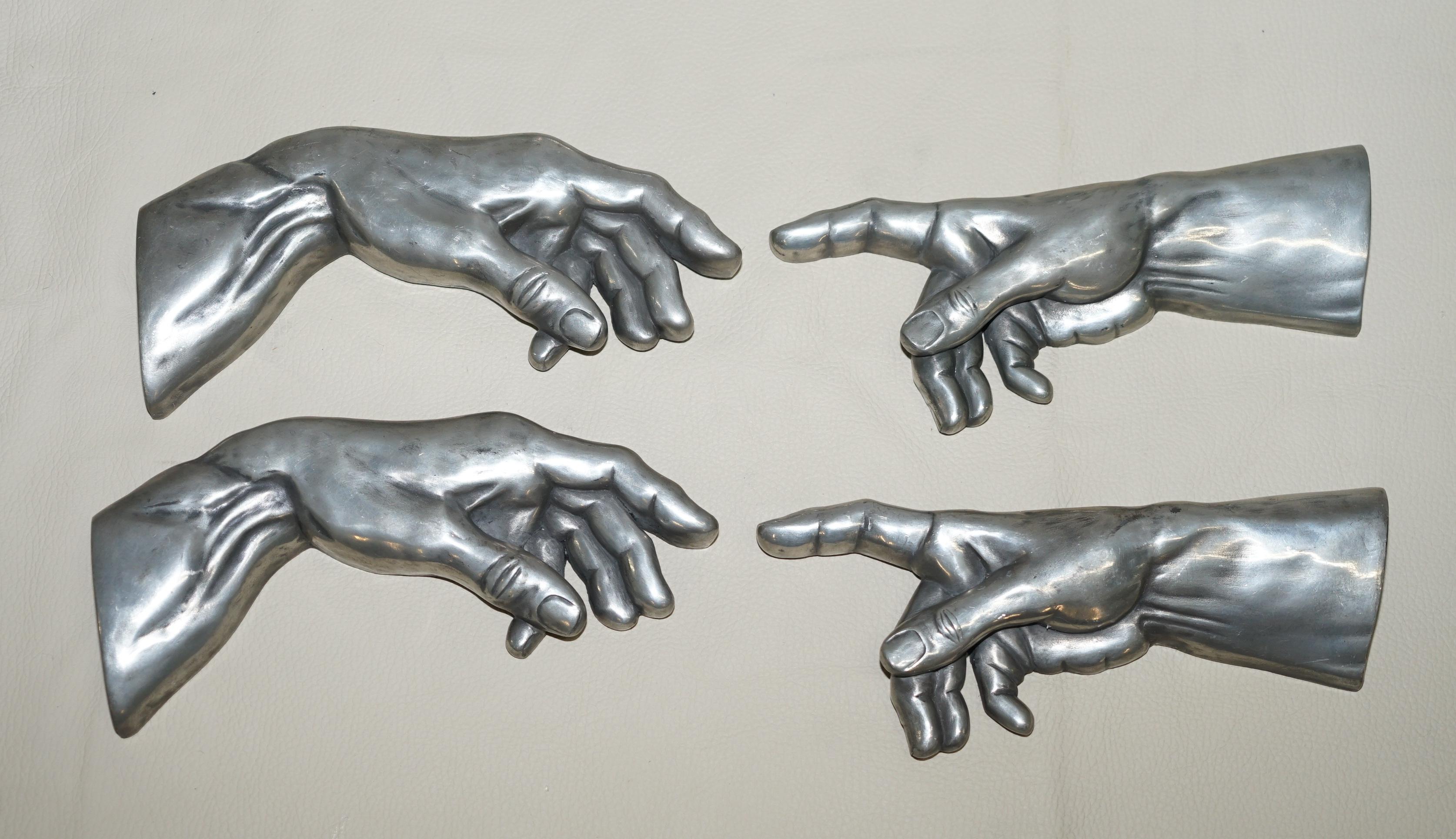 We are delighted to offer for sale 1 of 2 pairs of Compulsion Gallery 1994 hands based on the painting by Michelangelo in the Sistine Chapple depicting “The creation of Adam”

These are vintage from 1994, each one is stamped to the base of the