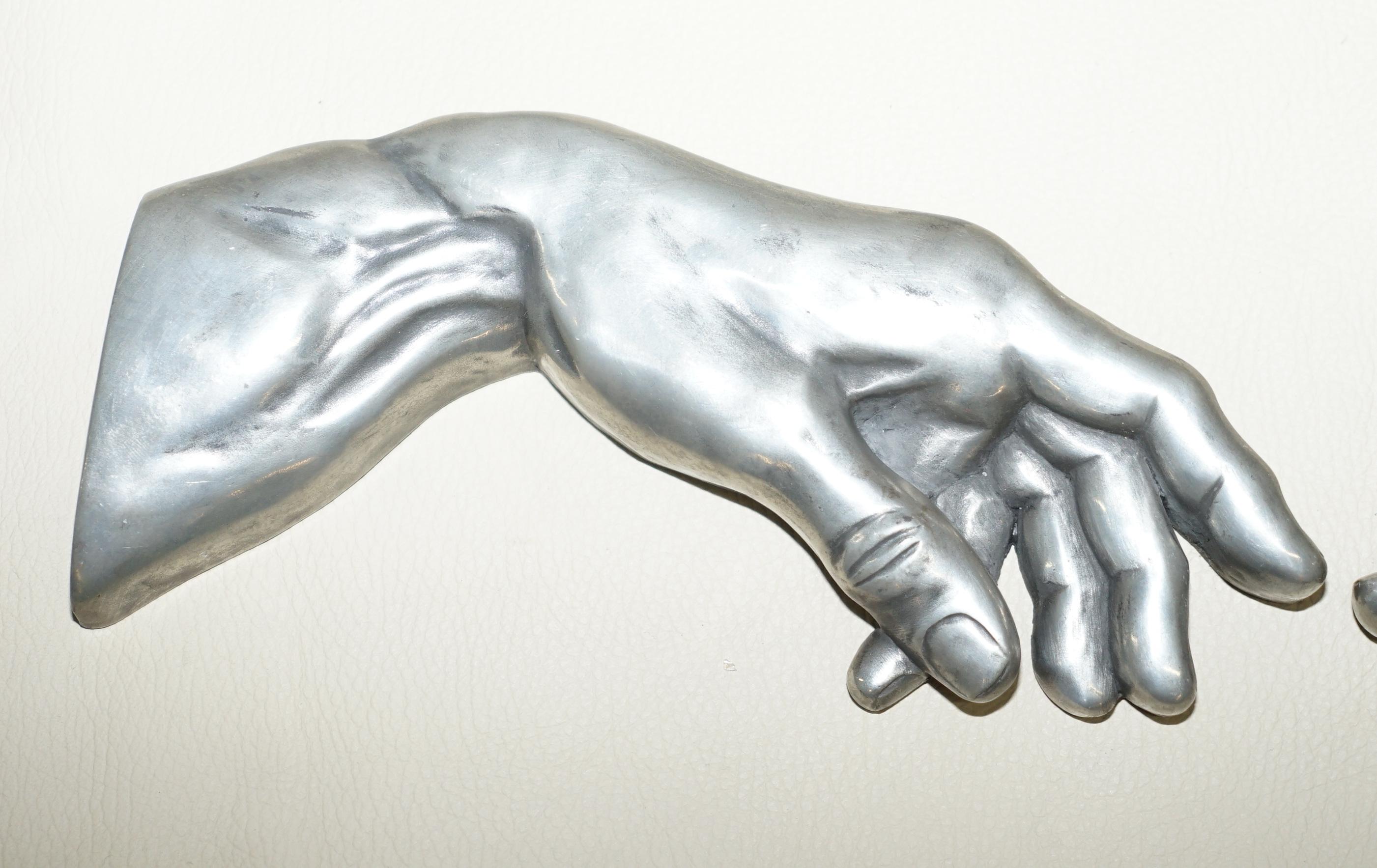 adam and god touching fingers