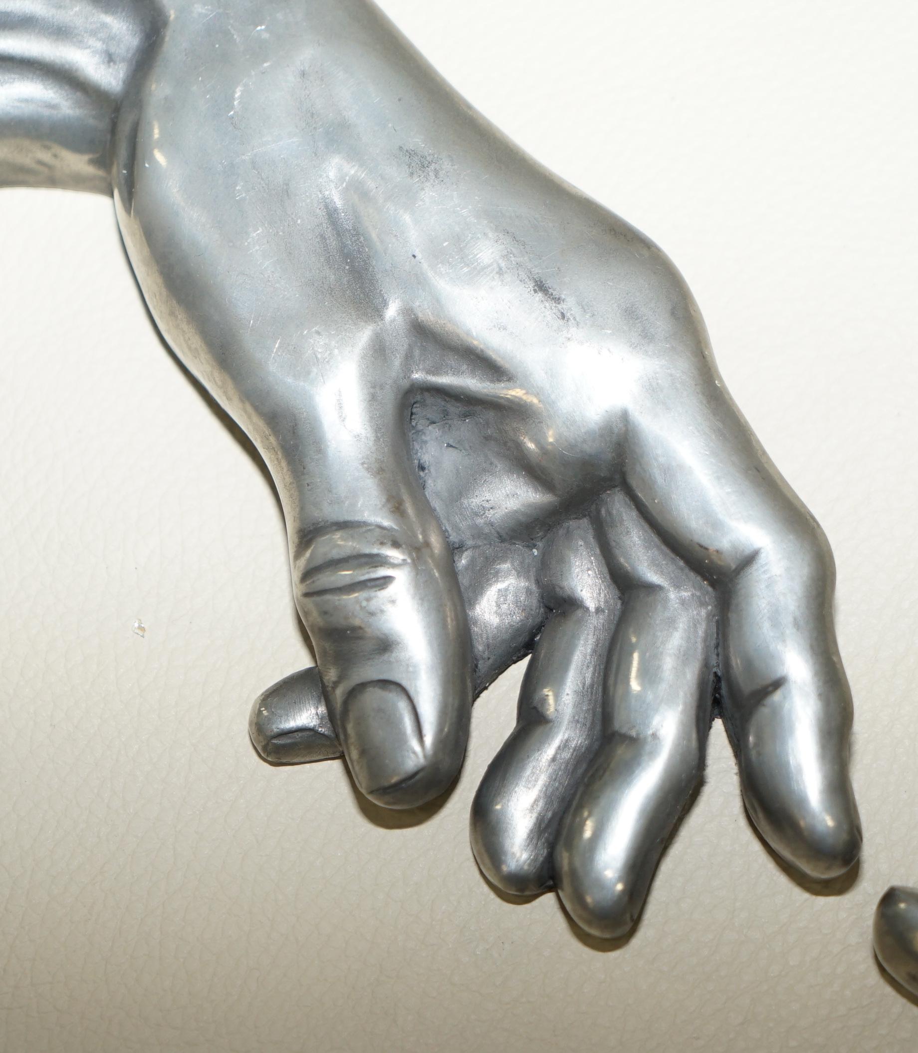 god touching adam