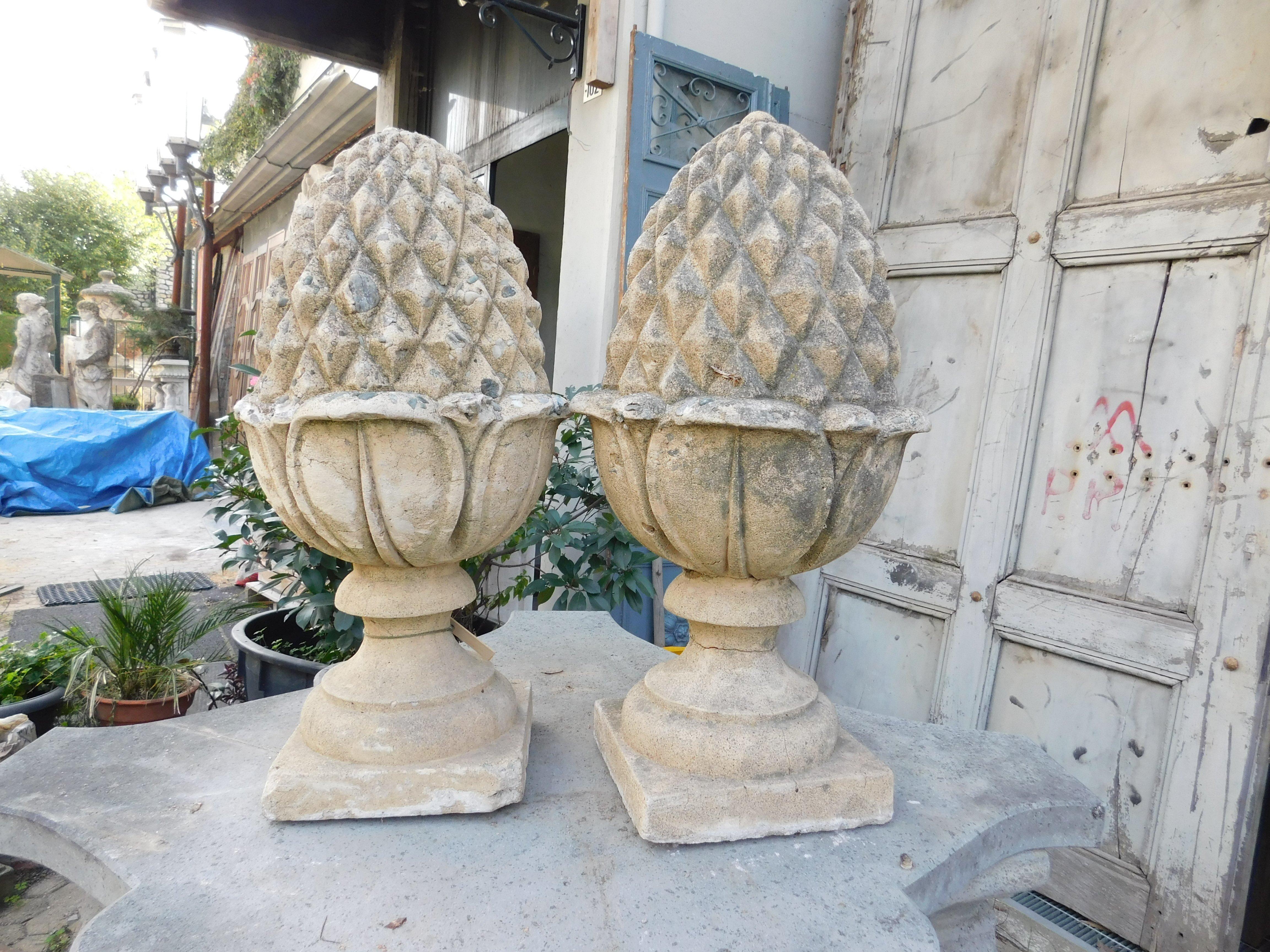 Ancient pair of concrete pine cones, they were a decoration on the top of the column, now usable to decorate exteriors, gardens, but also interiors or to indulge your imagination, built in Italy, at the beginning of the 1900s, each measuring 35 cm x