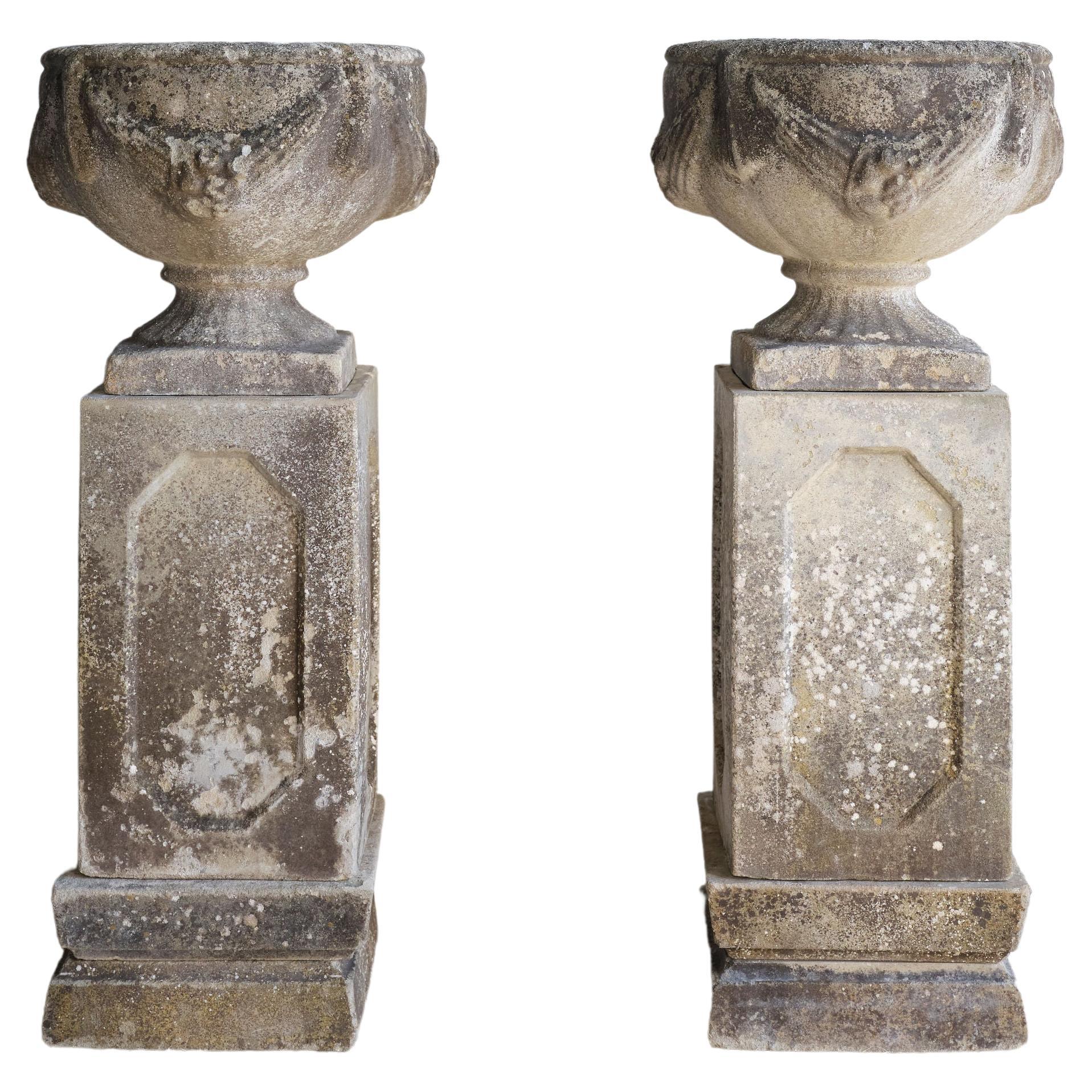 Pair of Concrete Swag Urns on Stands For Sale