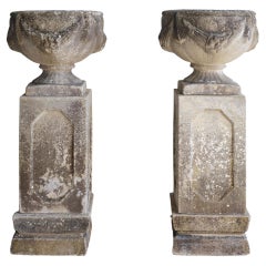 Pair of Concrete Swag Urns on Stands