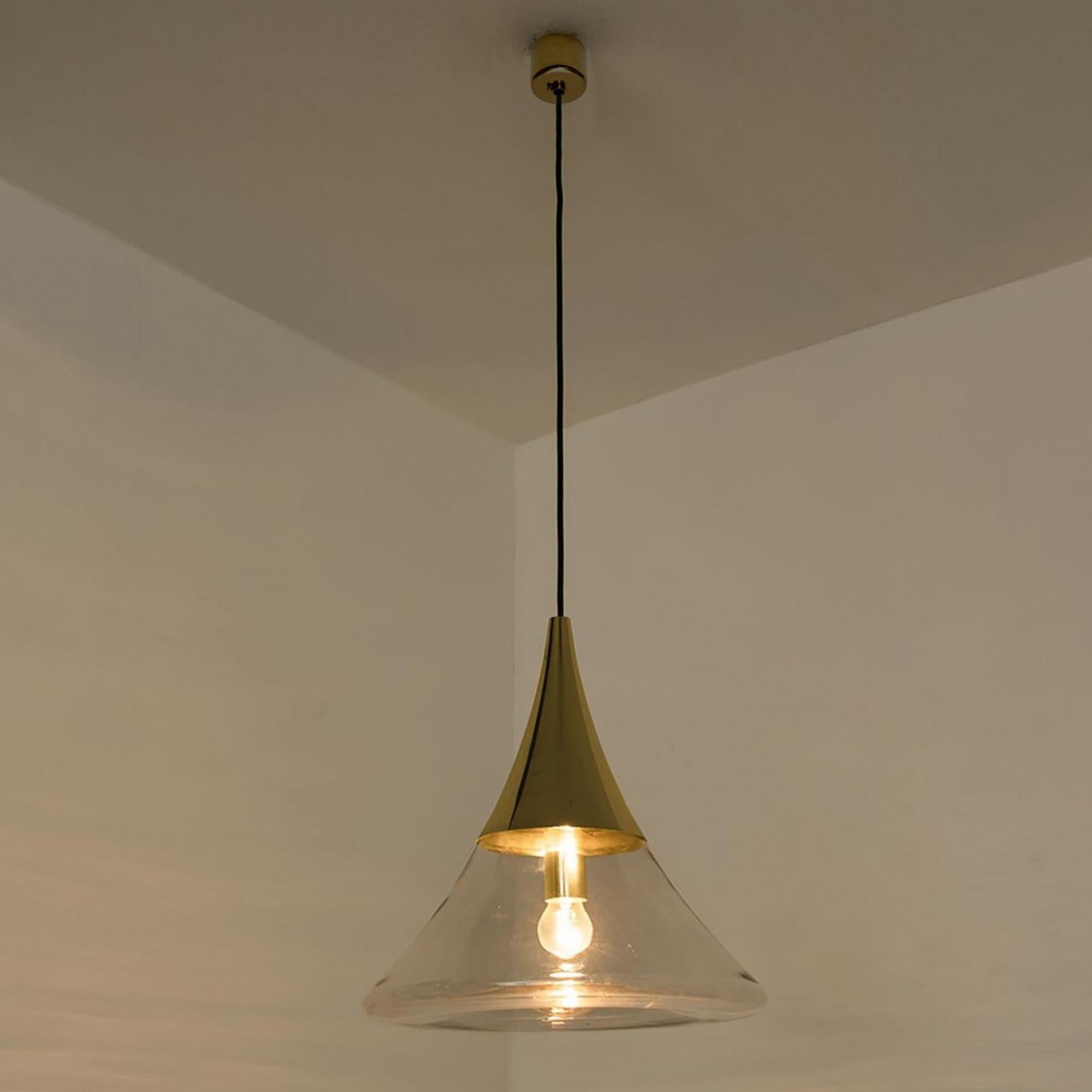 Pair of Cone Shape Brass and Clear Glass Pendant Lights by Limburg For Sale 1